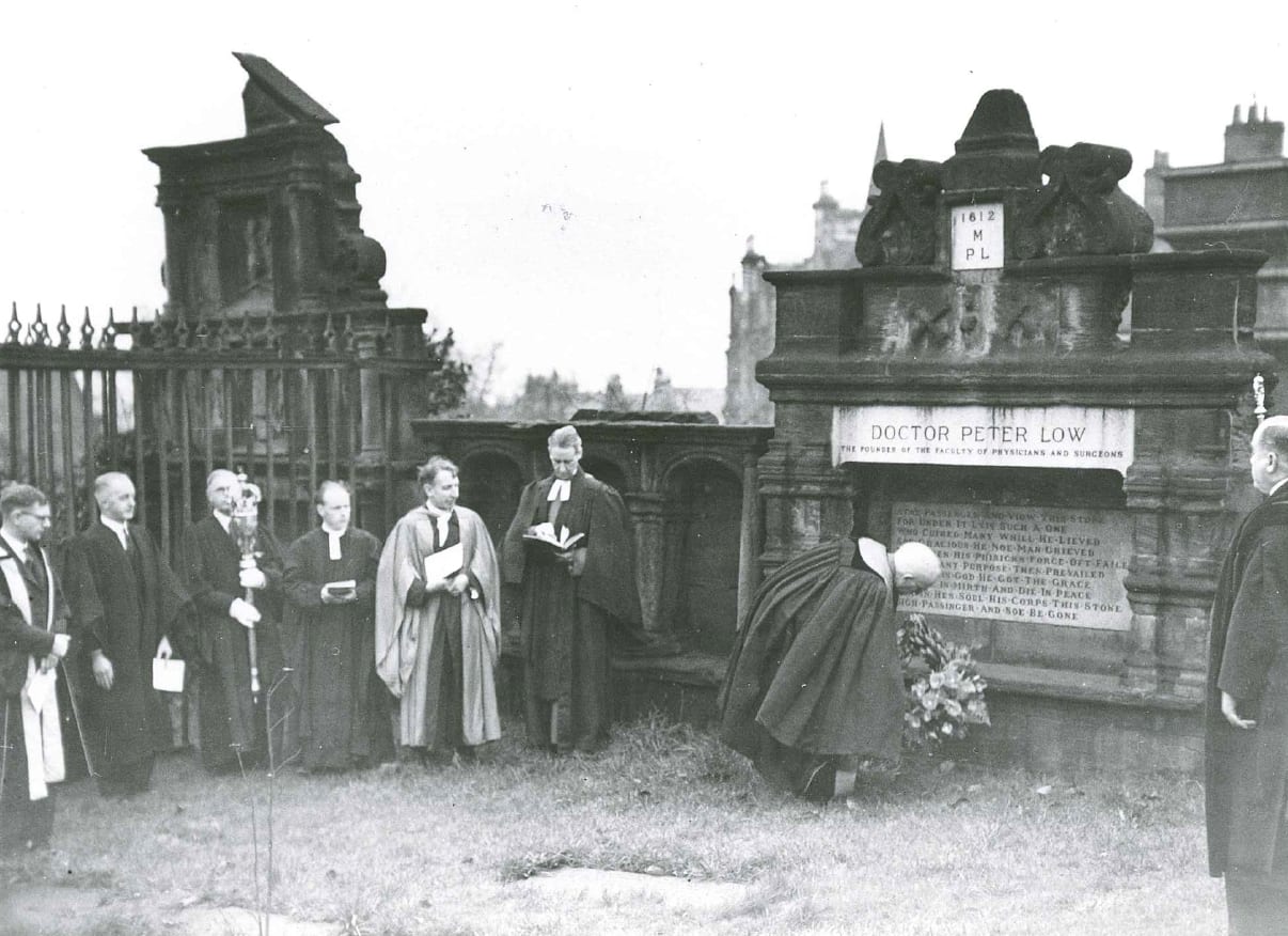 President W.R. Snodgrass, laying a wreath at Peter Lowe's tomb after the Commemoration Service on the 350th Anniversary of the Royal Faculty in November 1949 (RCPSG 1/12/7/189)