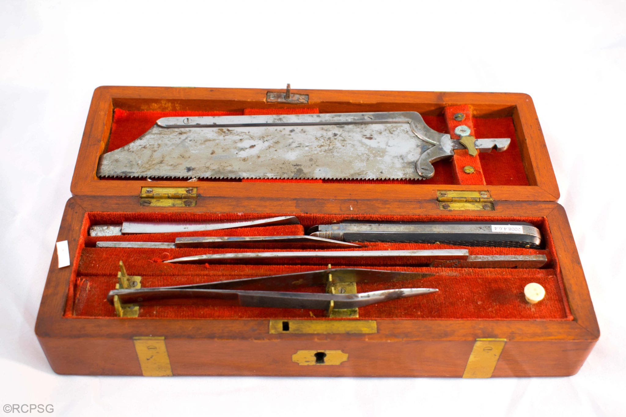Wooden case containing a 20th century post-mortem kit.