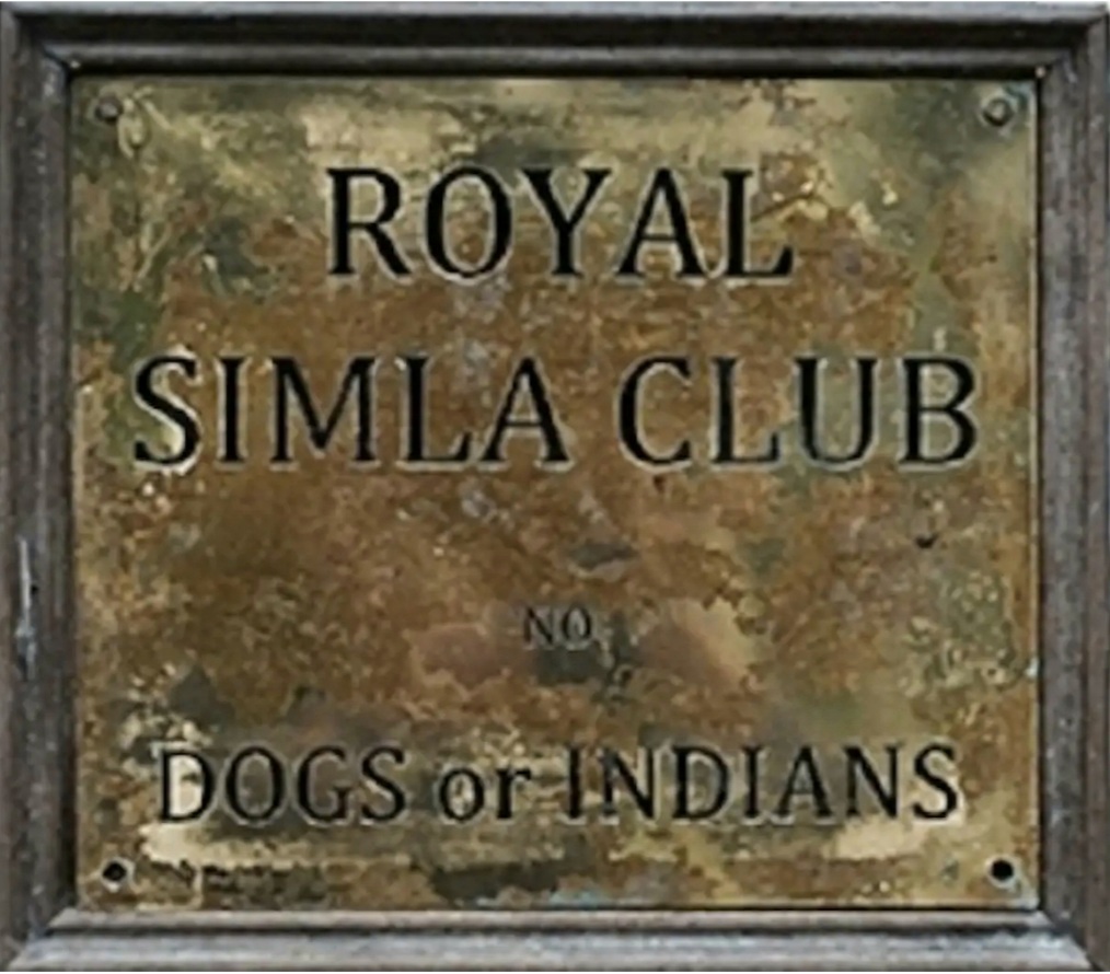 Brass sign reading Royal Simla Club. No dogs or Indians.